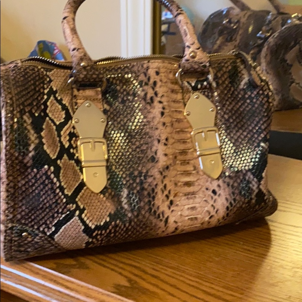 Cute New condition Aldo lilac snakeskin handbag